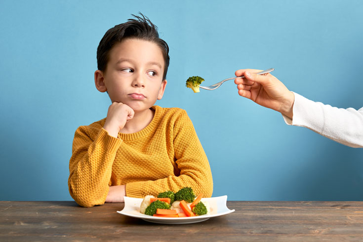 Child with healthy food